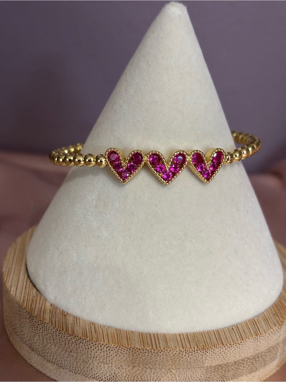Gold Beaded Bracelet with Pink Heart Accents